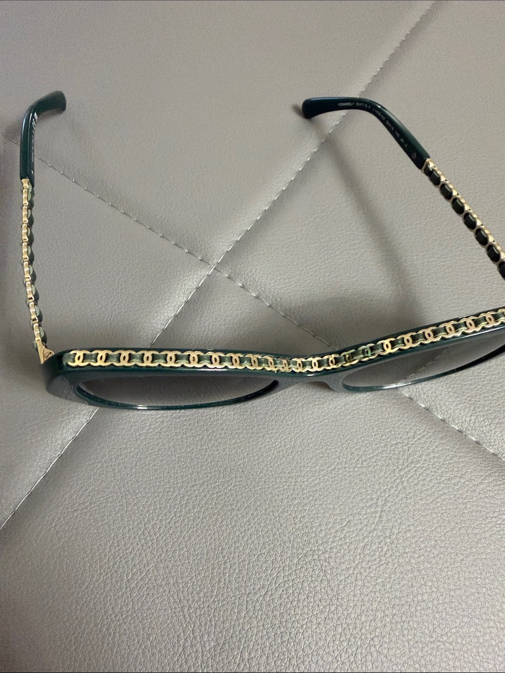Chanel sunglasses. 100 percent authentic. Dark green with gold accents.
